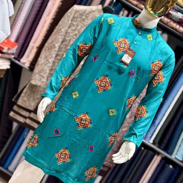Teal base with multi-colored embroidery including orange, red, yellow, blue, and green Kurta