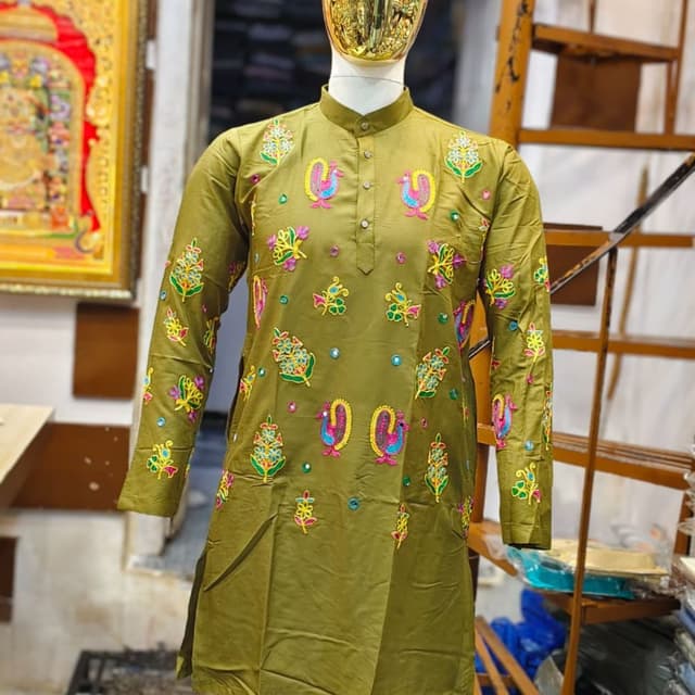 Olive green base with multicolored embroidery including yellow, pink, blue, and light green Kurta