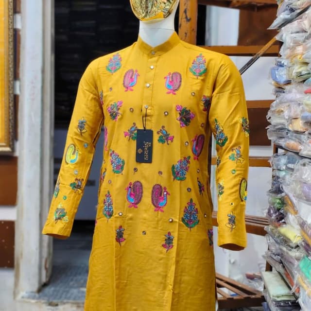 Mustard Yellow base with multicolored embroidery including pink, blue, green, and orange Kurta