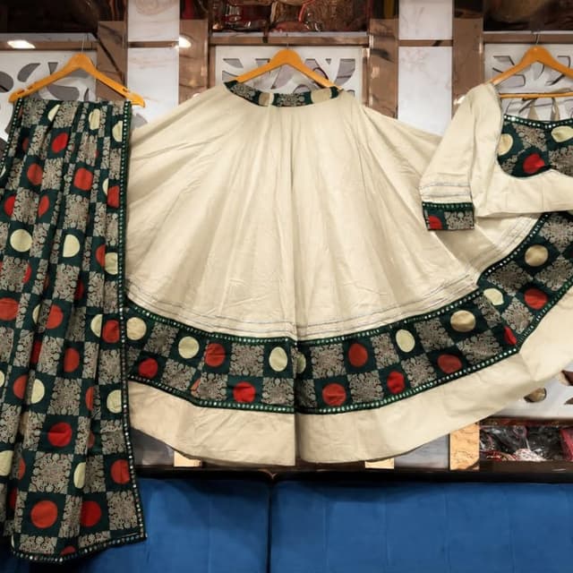 Off-white base with dark green, red, and silver accents Lehenga skirt