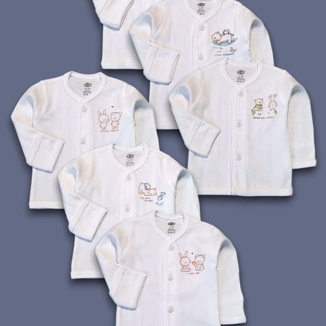 White base with pastel-toned character prints Baby shirt