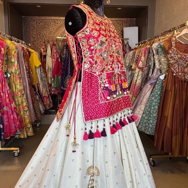 Hot pink, off-white, gold, and multi-colored accents Lehenga Choli