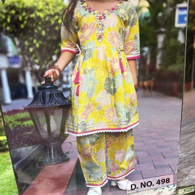 Yellow base with floral prints in soft pinks and greys Kurta and Palazzo Set