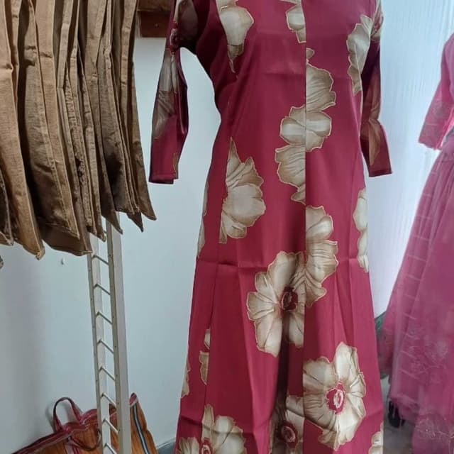 Maroon base with beige and off-white floral prints Kurti