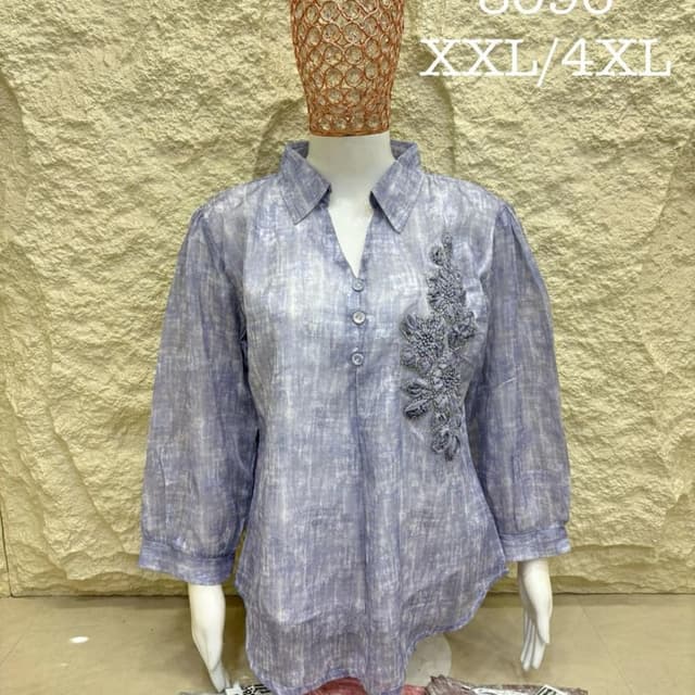 Light periwinkle blue with a mottled or textured white wash effect Shirt