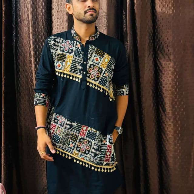 Black base with multi-colored embroidery (red, yellow, white, blue) and gold coin accents Kurta