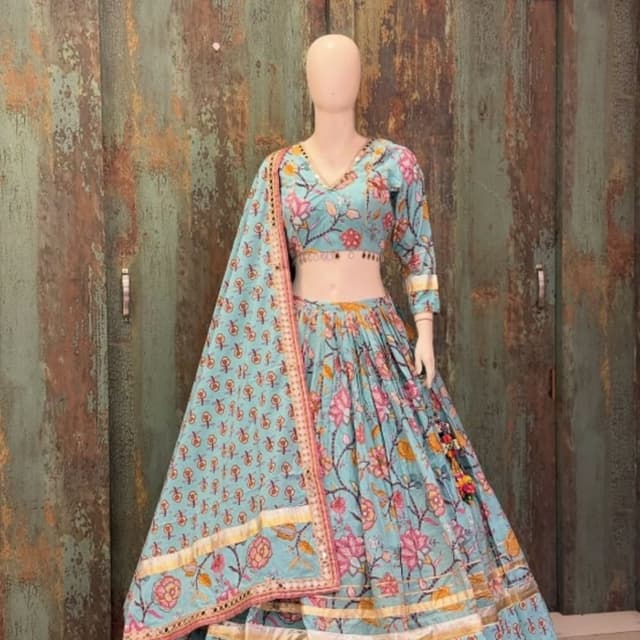 Light blue base with pink, orange, and green floral accents, gold borders Lehenga Choli