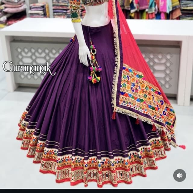Deep purple, vibrant multi-colored embroidery, and bright pink dupatta Lehenga Choli
