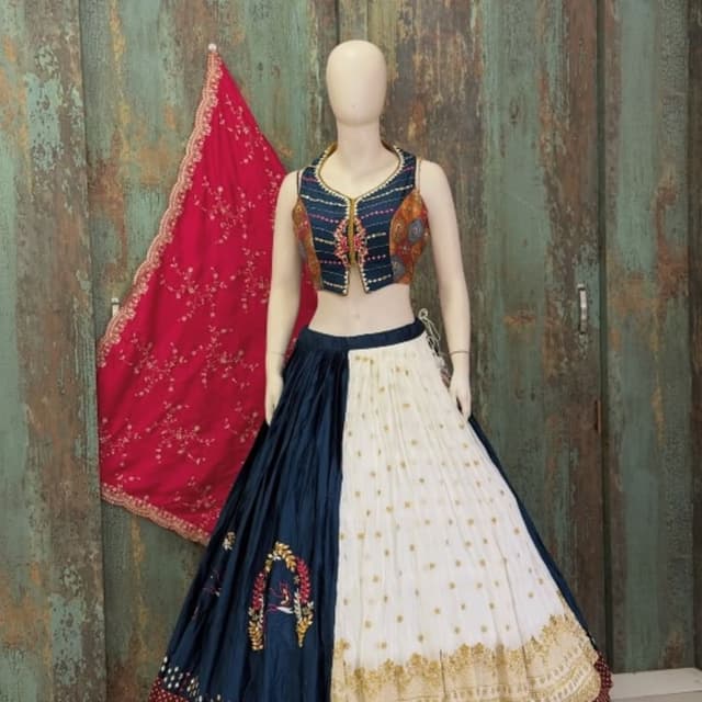Navy blue, cream/off-white, deep red/maroon, hints of orange and yellow Lehenga Choli