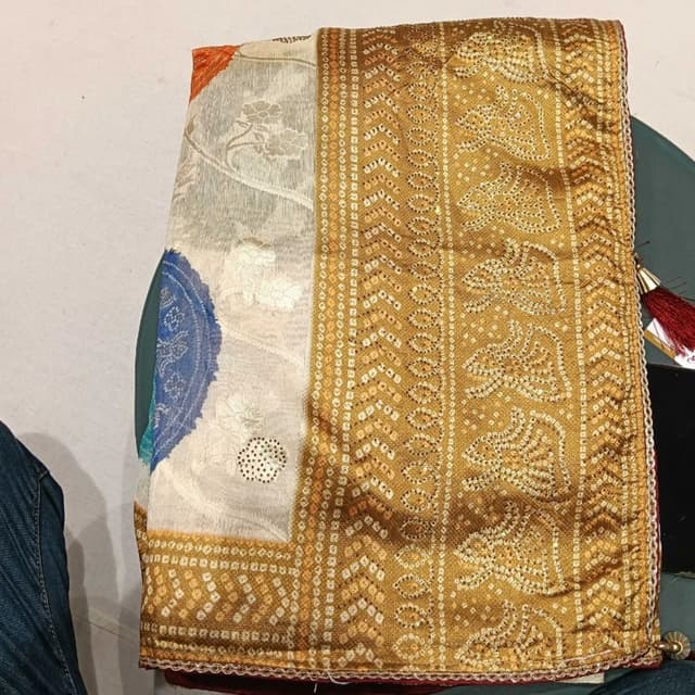 Golden mustard, cream, off-white, and hints of blue Saree