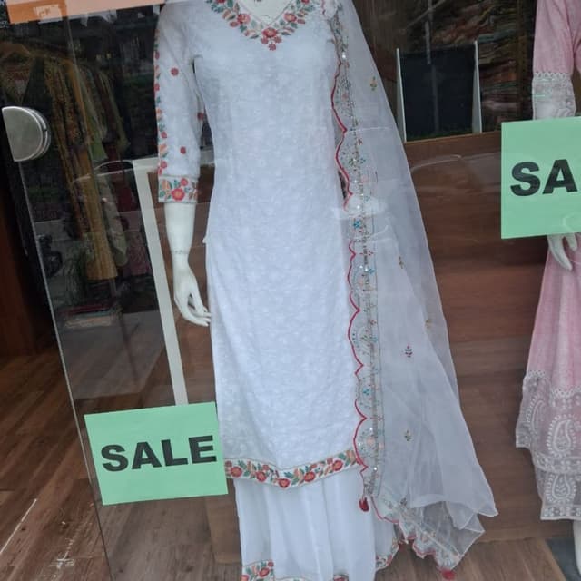 White base with multi-colored floral embroidery (red, green, orange) Salwar Suit Set