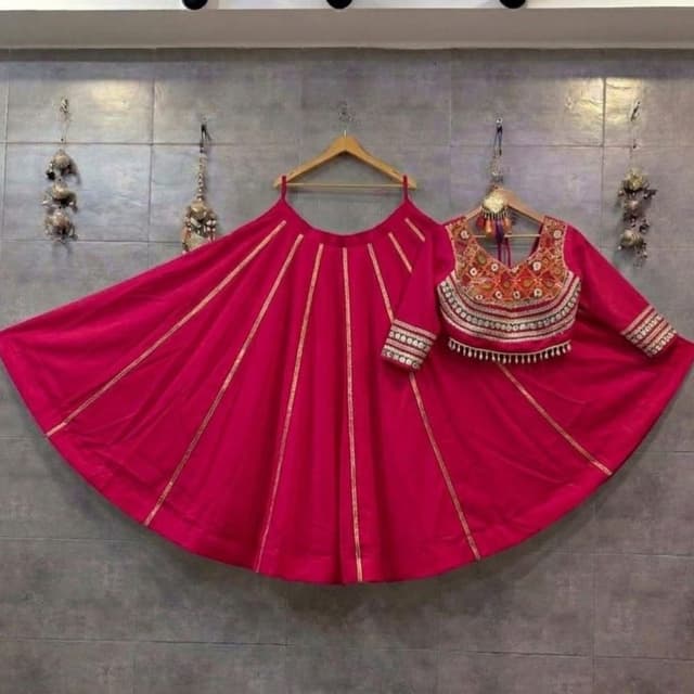Hot pink, gold, and multicolored embroidery Lehenga Choli