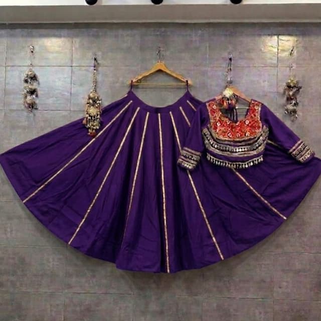 Deep purple, multi-color embroidery, gold metallic accents Lehenga Choli