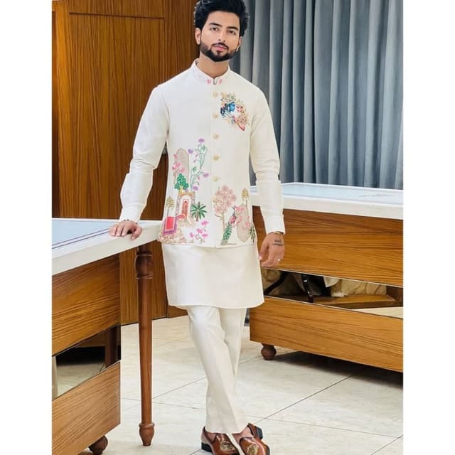 Off-white base with multicolor hand-painted/embroidered motifs Nehru Jacket with Kurta and Trousers