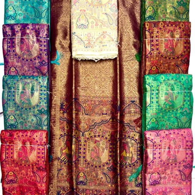 Deep maroon, gold, cream, multi-colored accents Saree