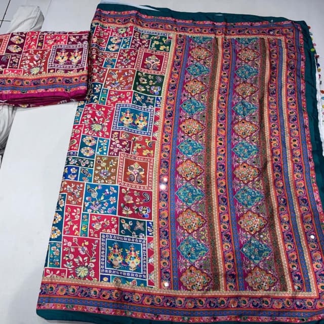 Magenta, teal, orange, blue, gold, and multi-color accents Saree