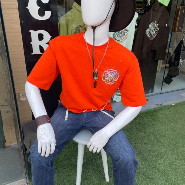 Vibrant orange t-shirt with blue denim jeans T-shirt and Jeans outfit