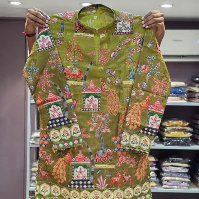 Olive green base with multicolored embroidery including pink, blue, orange, yellow, and cream Kurta
