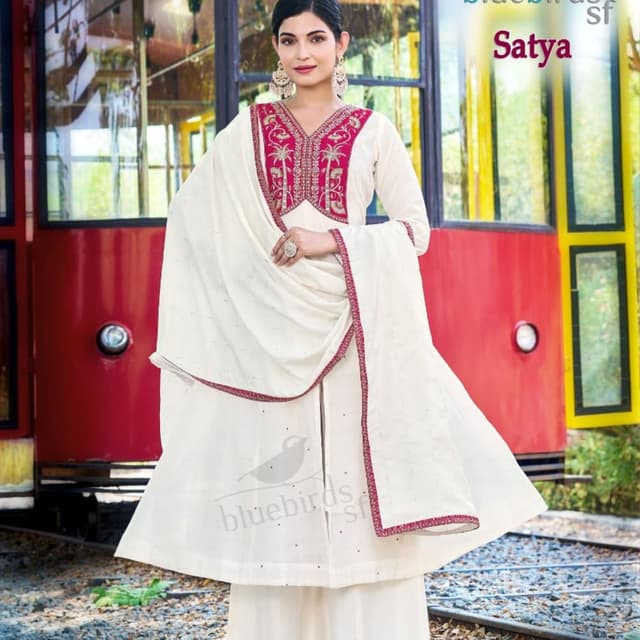 Off-white base with magenta/fuchsia pink embroidery accents Kurta with Palazzo and Dupatta Set