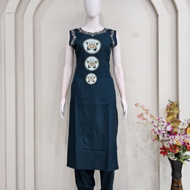Deep teal or dark blue base with multi-colored butterfly embroidery Kurta Set
