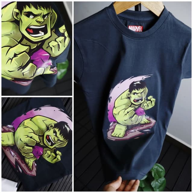 Navy blue base with green, purple, and black graphic print T-shirt