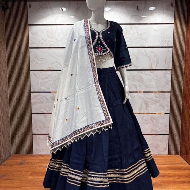 Navy Blue and Off-White with accents of silver and multi-colored threads Lehenga Choli