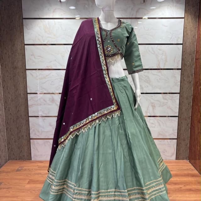 Sage green base with deep plum/burgundy dupatta, accented with gold and metallic tones Lehenga Choli
