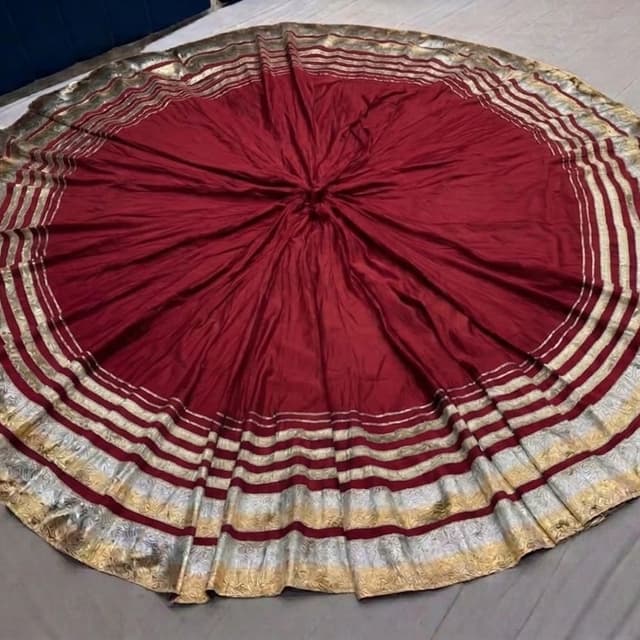 Deep maroon base with gold and silver metallic borders Lehenga Skirt