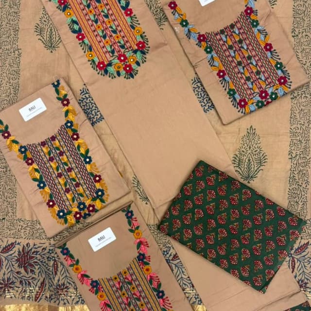 Beige base with multi-colored embroidery (red, yellow, blue, green) and dark green printed accents Salwar Kameez Unstitched Fabric Set