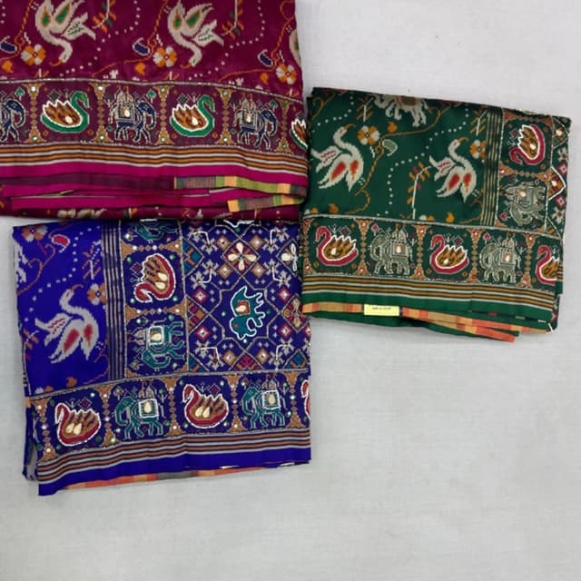 Maroon, Dark Green, Royal Blue, Multi-colored accents Saree