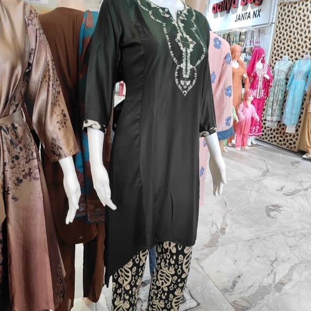 Black base with cream and white accents Kurti with pants set