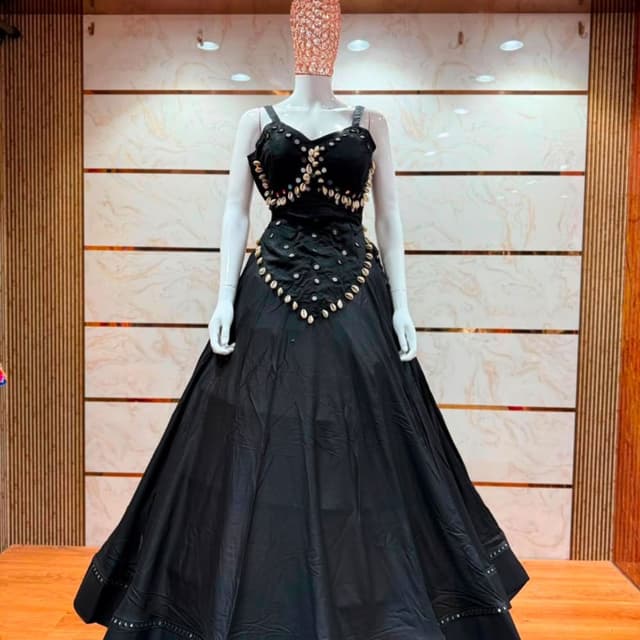 Solid black with white accents from shell embellishments Lehenga Choli