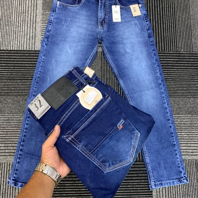 Medium blue with light blue highlights and fading Jeans
