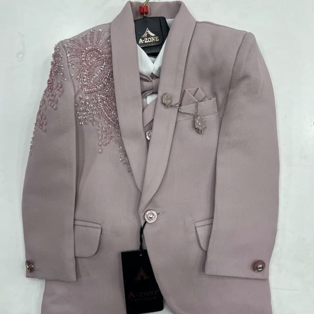 Dusty pink or mauve with white and metallic accents Blazer