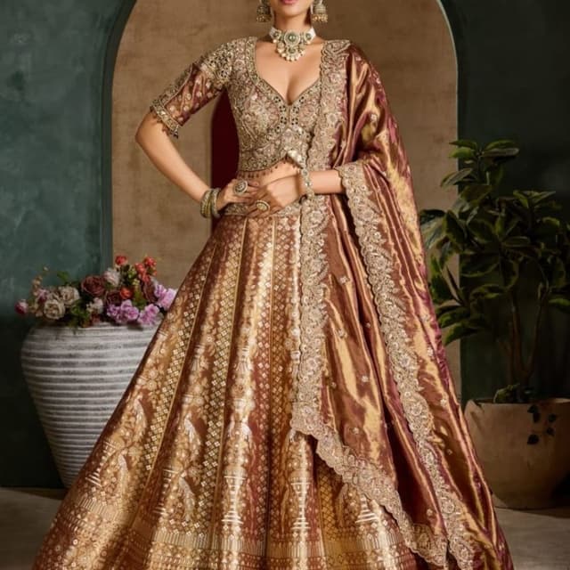 Deep copper, metallic brown, and gold Lehenga Choli