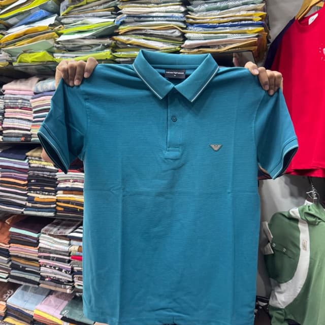 Teal blue with subtle white trim on collar and sleeves Polo Shirt
