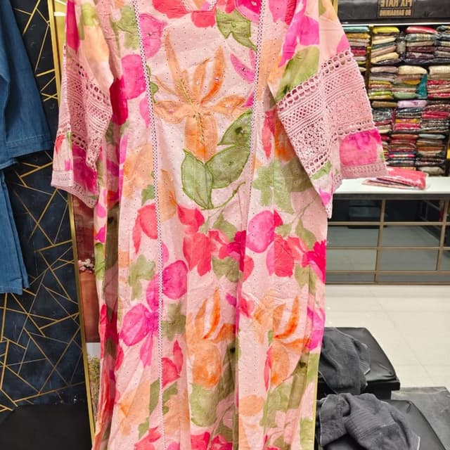 Light pink base with bright pink, coral, orange, and sage green accents Kurti