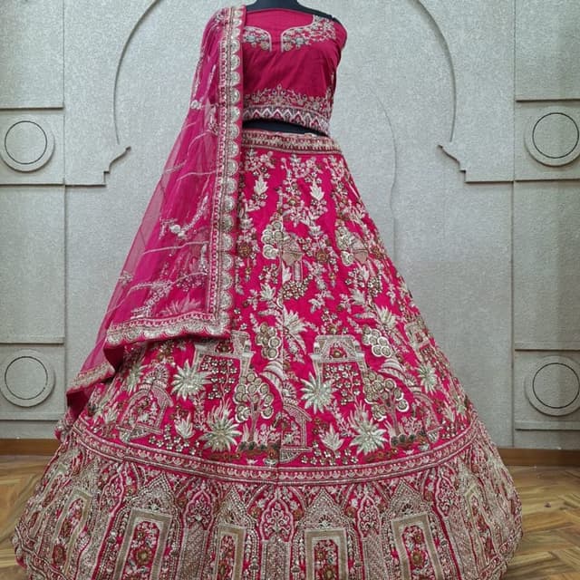 Magenta pink with gold, silver, and multi-colored accents Lehenga Choli