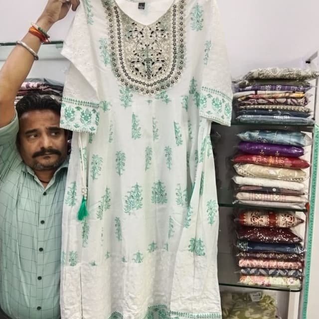 White base with mint green block print and silver/black accent work Kurti