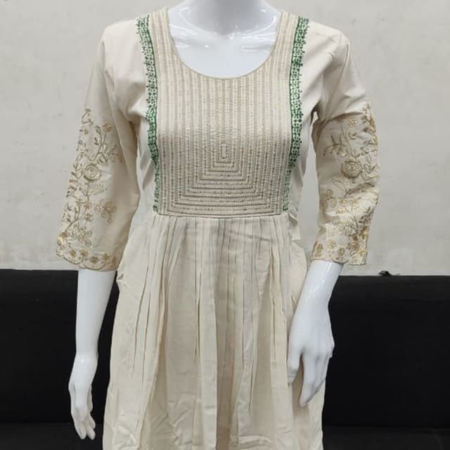 Off-white base with green and gold embroidery and block print accents Kurti
