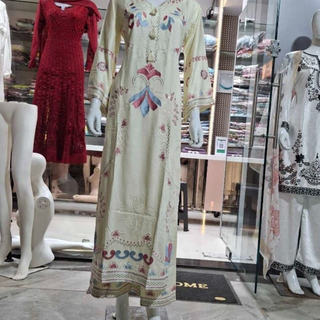 Cream base with floral embroidery in shades of red, blue, and green Kurta with Dupatta