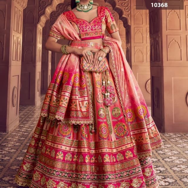 Hot pink, peach, orange, and metallic gold Lehenga Choli