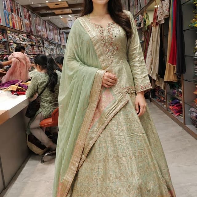 Sage green, soft pink, and metallic gold Lehenga Choli with Dupatta