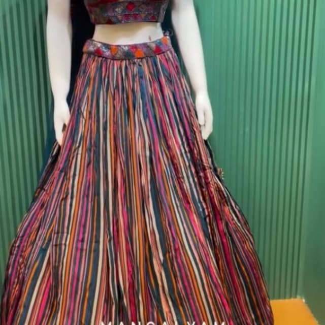 Multicolor stripes featuring deep blue, vibrant pink, orange, and gold tones Lehenga Choli