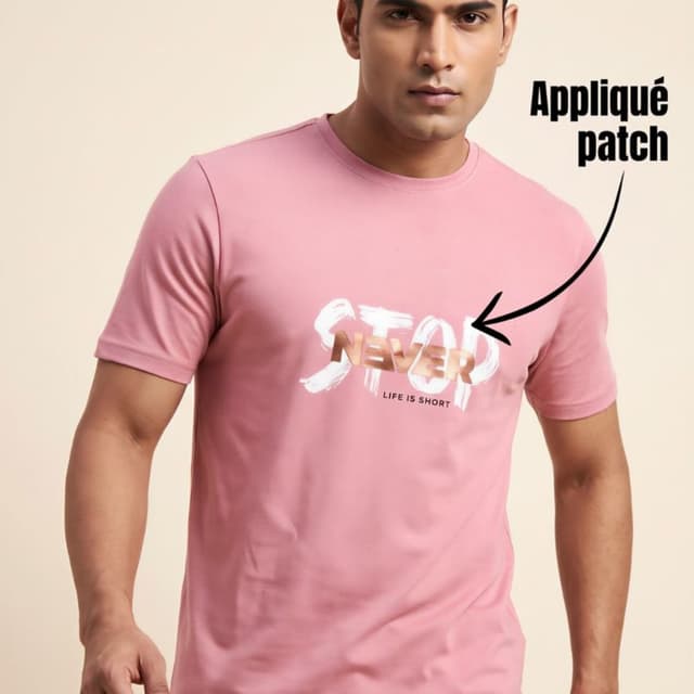 Dusty rose pink base with white brush-stroke graphic and metallic gold lettering T-shirt