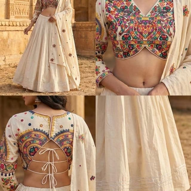 Off-white base with multi-colored embroidery including red, yellow, green, blue, and pink Lehenga Choli