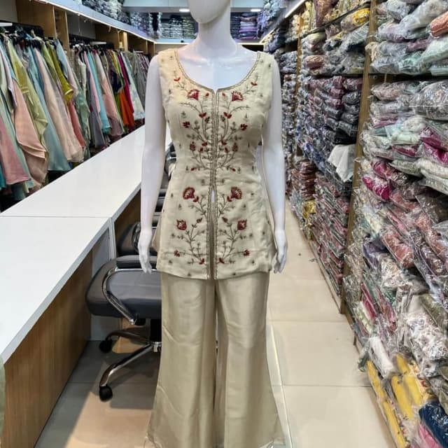 Beige and cream base with maroon, red, and gold accents Co-ord set