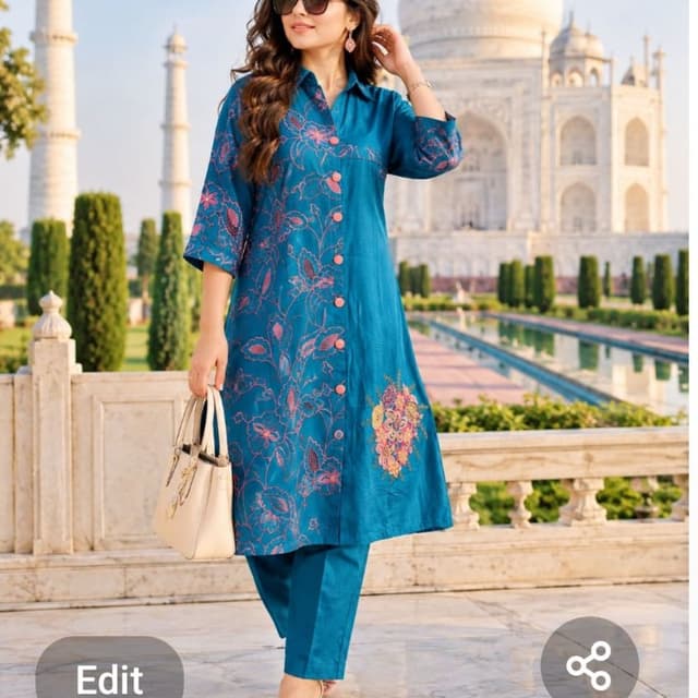 Deep blue base with pink, orange, and yellow floral accents Kurti with trousers