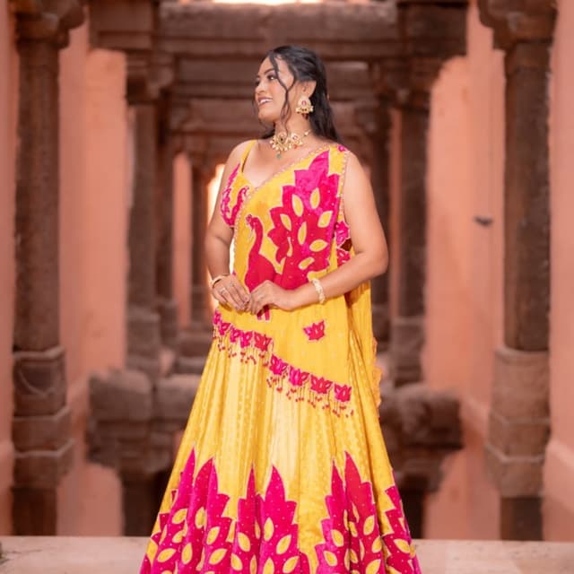 Yellow and Bright Pink Lehenga Choli