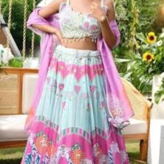 Pastel blue, vibrant pink, orange, and hints of green Lehenga Choli